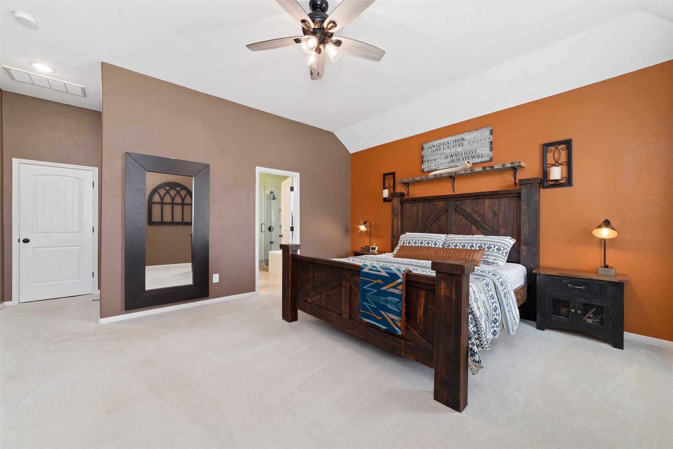9902 Indian Rill Court Tomball, TX 77375 - Photo 14 of 34 Your upgraded en-suite primary bathroom and huge 12x9 walk-in closet are located behind the open door.