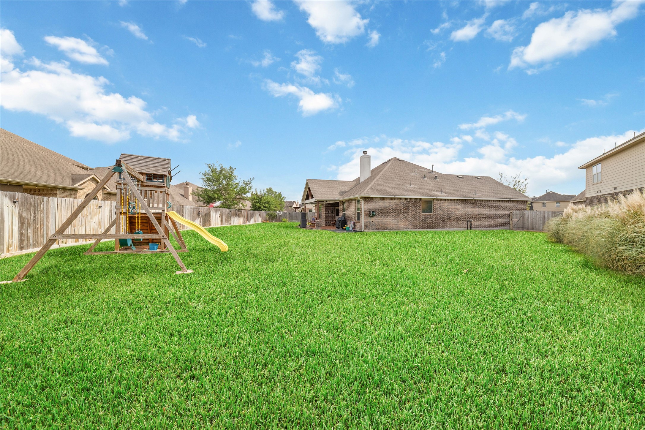 9902 Indian Rill Court Tomball, TX 77375 - Photo 25 of 34 Lots of room for never-ending fun in your fully fenced private backyard! Plenty of room for a playset, pool, and shed.