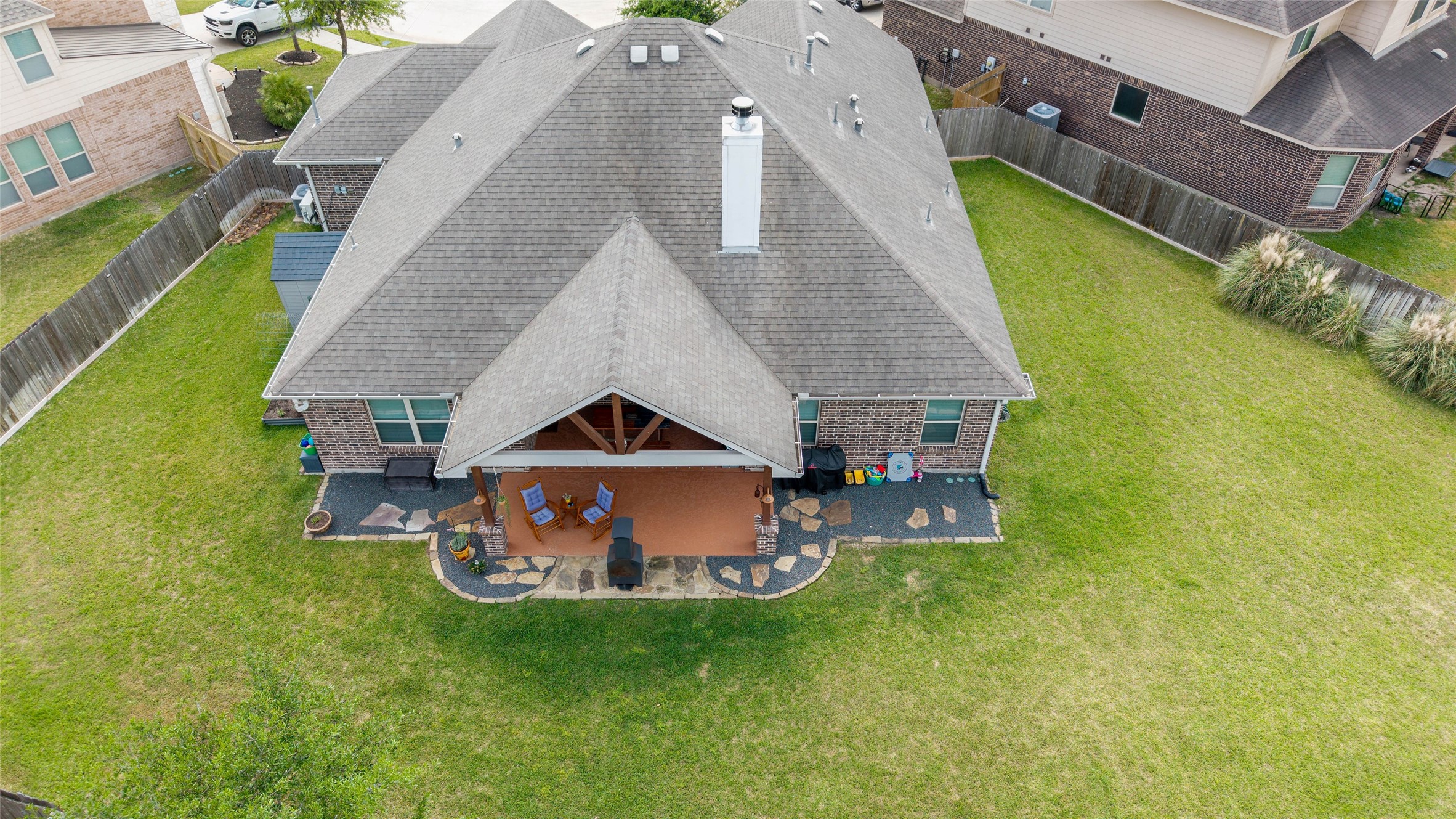 9902 Indian Rill Court Tomball, TX 77375 - Photo 26 of 34 Lots of room for never-ending fun in your fully fenced private backyard! Plenty of room for a playset, pool, and shed.