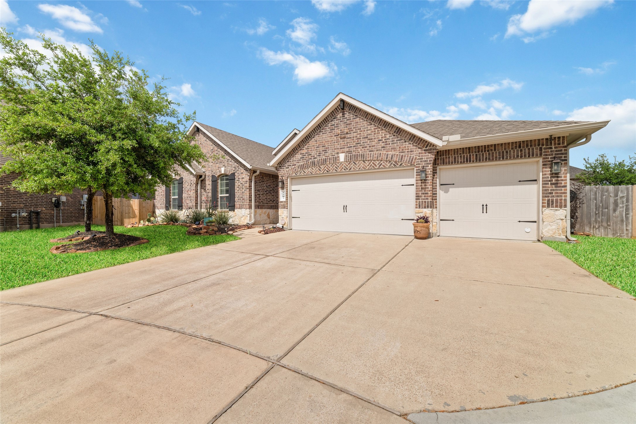 9902 Indian Rill Court Tomball, TX 77375 - Photo 33 of 34 A rare find with a true, climate-controlled 3-car garage and extra wide driveway!