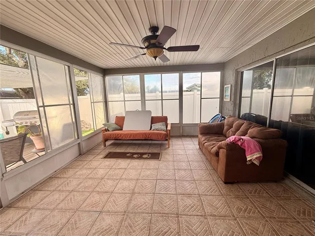 a backyard of a house with yard and barbeque oven