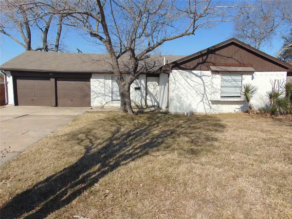a view of a backyard of a house