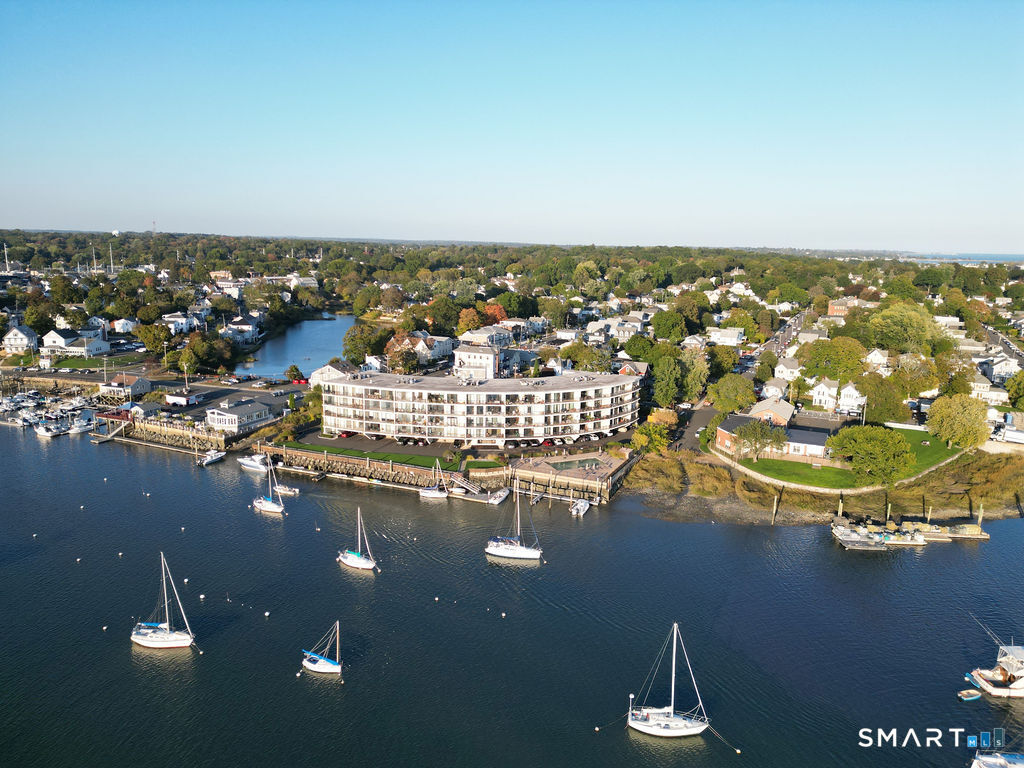 100 Seaview Avenue, Unit 2J Norwalk, CT 06855 - Photo 27 of 36 an aerial view of residential houses with outdoor space