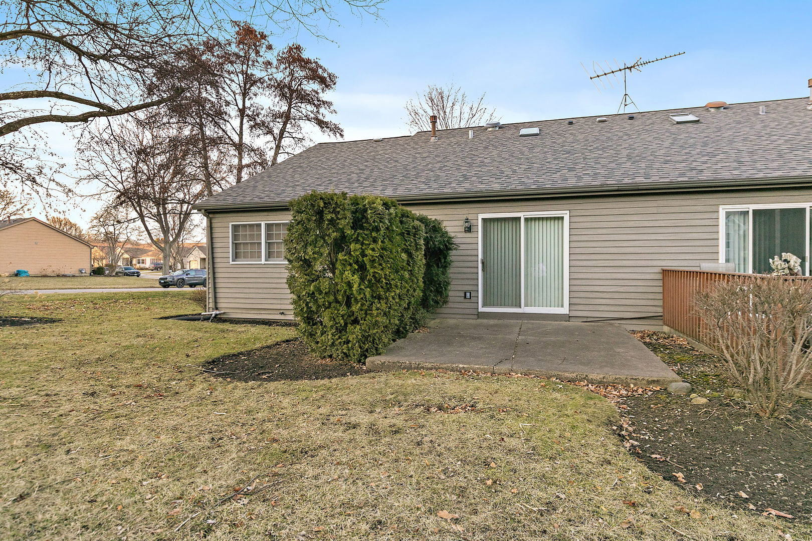 682 Alice Place, Unit 682 Elgin, IL 60123 - Photo 17 of 18 a view of a house with a yard and garage