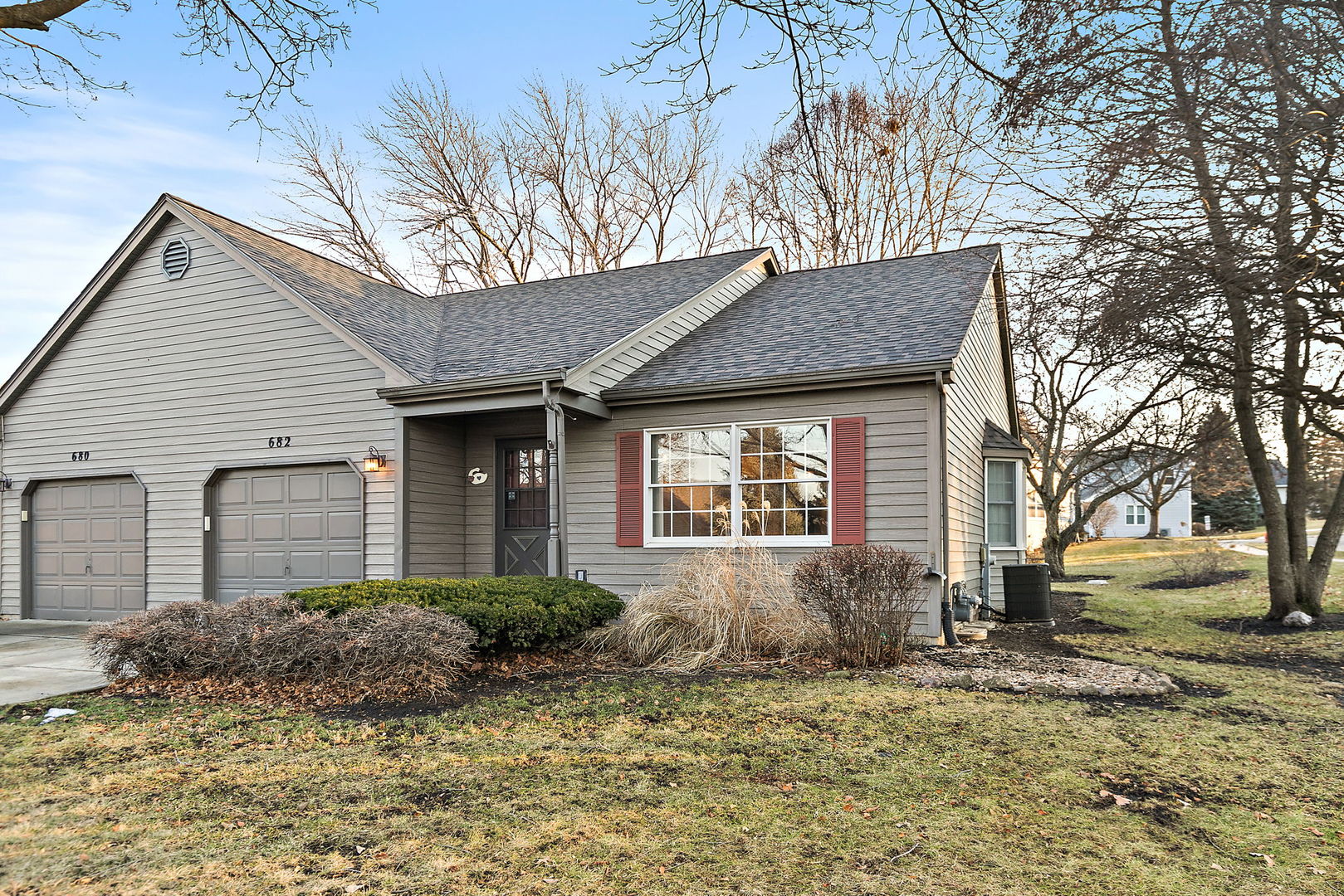 682 Alice Place, Unit 682 Elgin, IL 60123 - Photo 2 of 18 a view of a house with a yard
