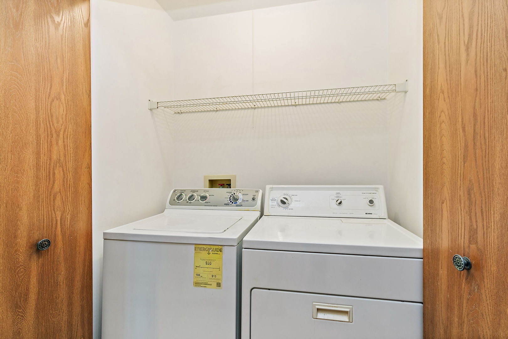 682 Alice Place, Unit 682 Elgin, IL 60123 - Photo 9 of 18 a utility room with dryer and washer