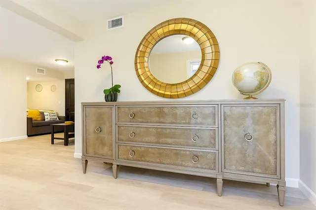 a bathroom with a sink a mirror and a mirror