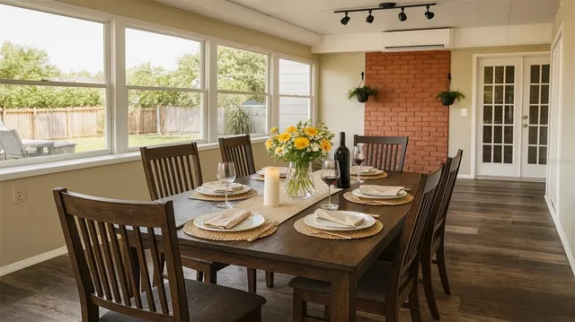 a view of a dining room with furniture window and outside view
