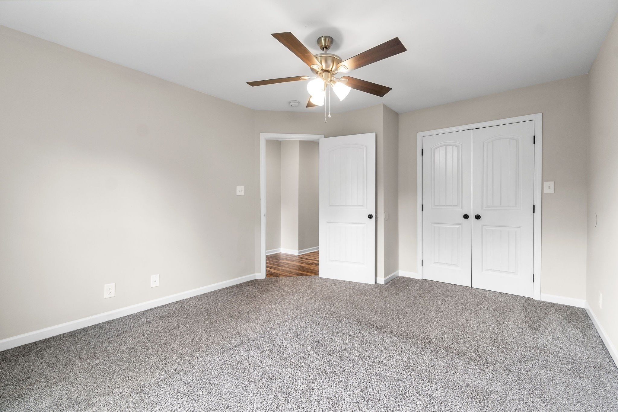 1709 Evans Road, Unit B Clarksville, TN 37042 - Photo 14 of 24 an empty room with closet and fan