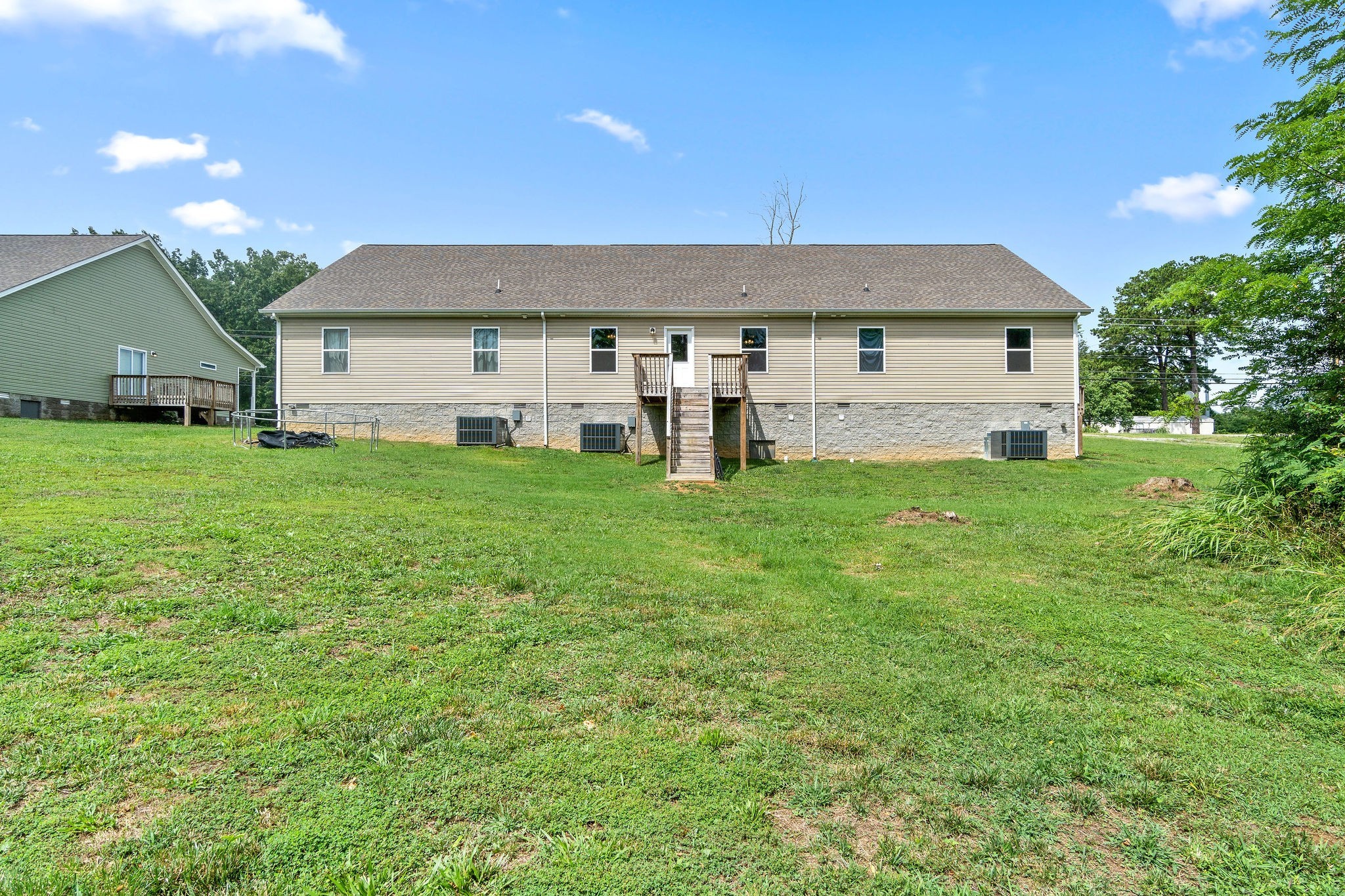 1709 Evans Road, Unit B Clarksville, TN 37042 - Photo 22 of 24 a view of a yard in front of a house with large tree