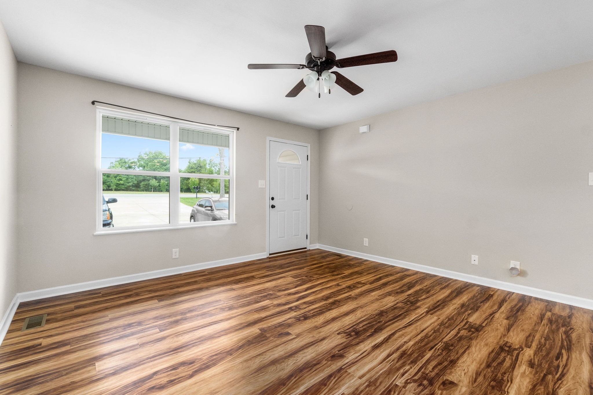 1709 Evans Road, Unit B Clarksville, TN 37042 - Photo 8 of 24 a view of empty room with wooden floor and fan