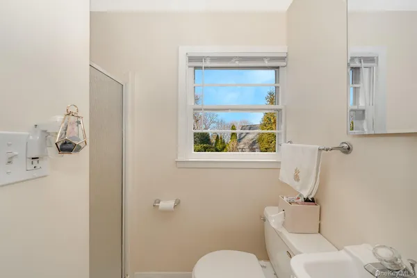 a bathroom with a toilet and a sink