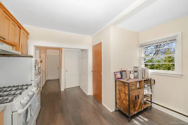 a room with furniture and wooden floor