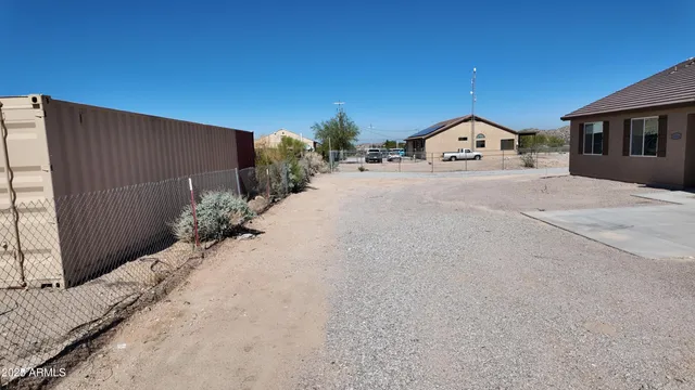 a view of a house with a street