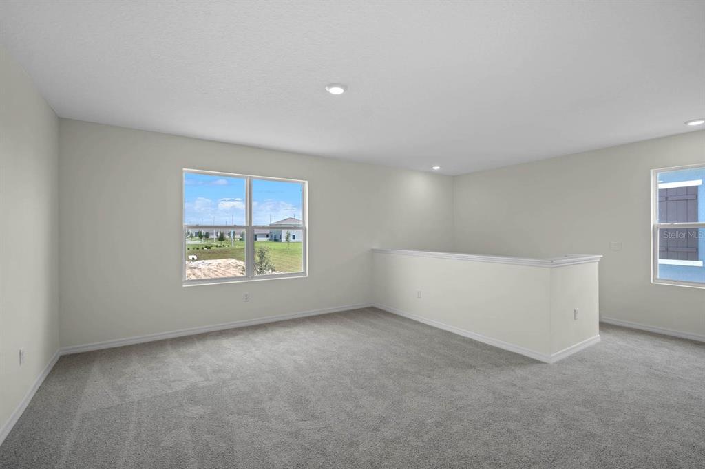 1217 Alstonia Mount Mount Dora, FL 32757 - Photo 14 of 33 a view of an empty room with a window