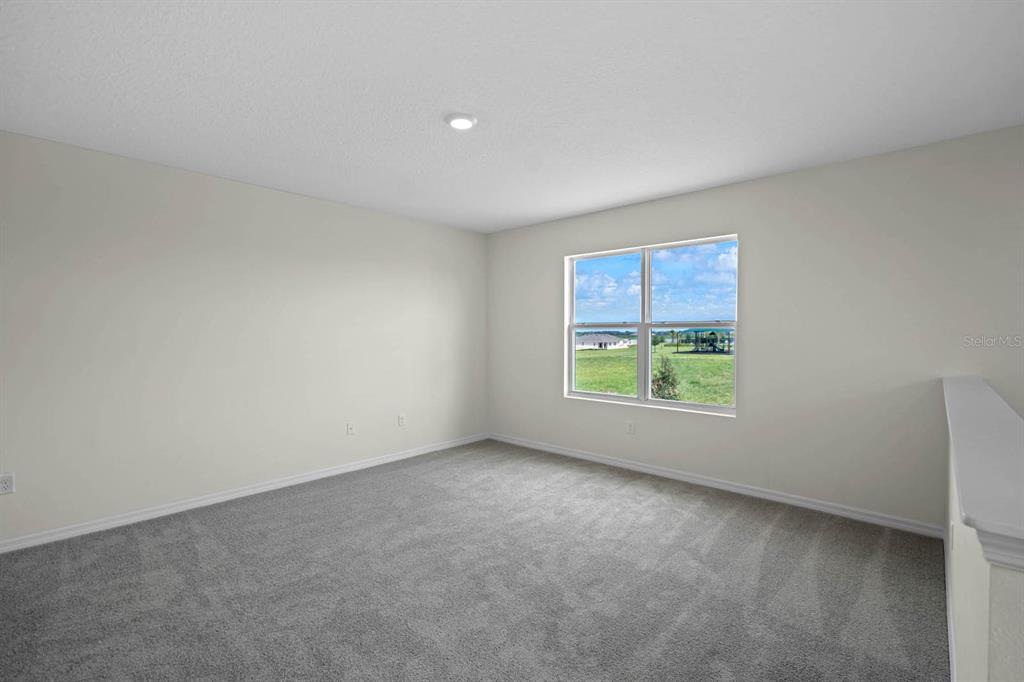 1217 Alstonia Mount Mount Dora, FL 32757 - Photo 15 of 33 an empty room with windows