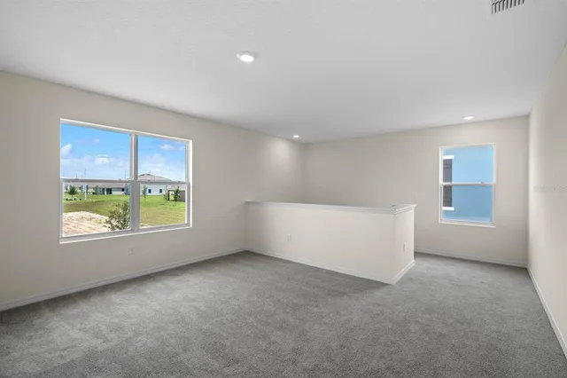 an empty room with windows