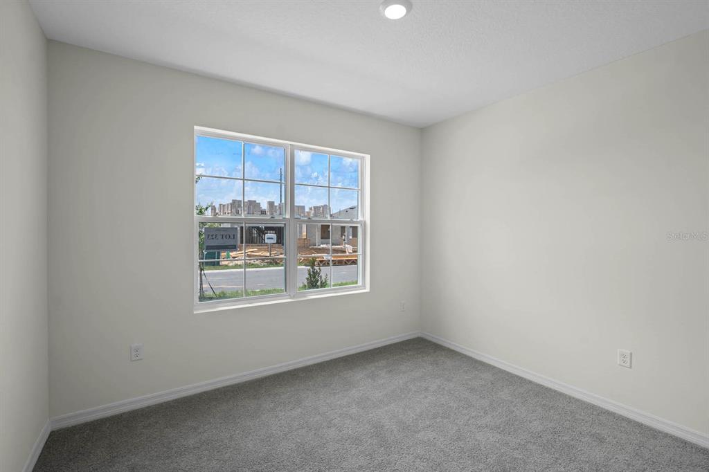 1217 Alstonia Mount Mount Dora, FL 32757 - Photo 33 of 33 an empty room with a window