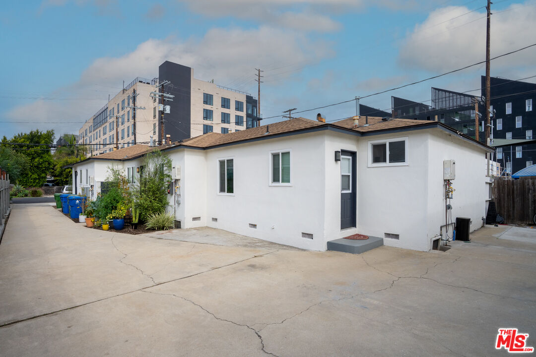 10720 Charnock Road Los Angeles, CA 90034 - Photo 8 of 33 a view of a house with a patio