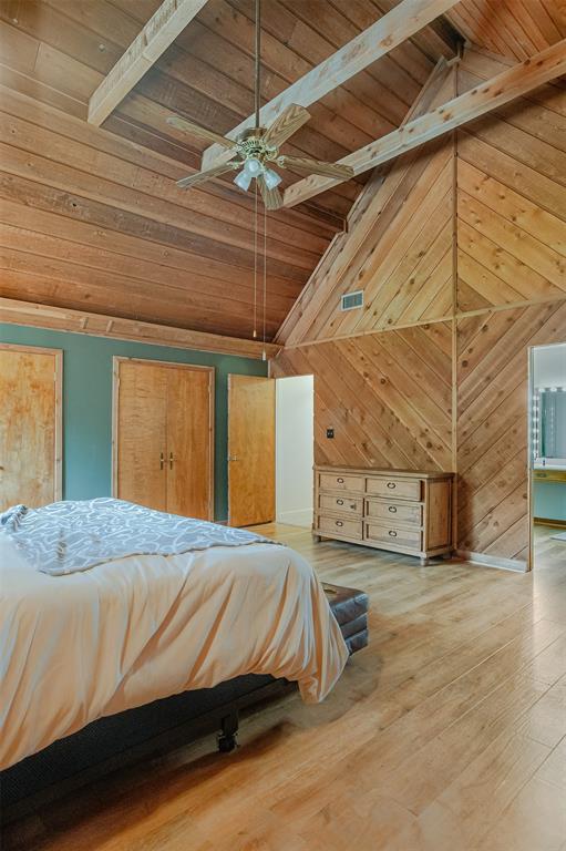 10307 Pirogue Road Oil City, LA 71061 - Photo 20 of 36 a bed sitting in a spacious bedroom next to a window