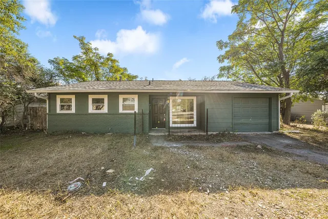 front view of a house and a yard