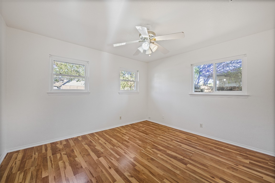3007 Steck Avenue Austin, TX 78757 - Photo 13 of 15 a view of empty room with wooden floor