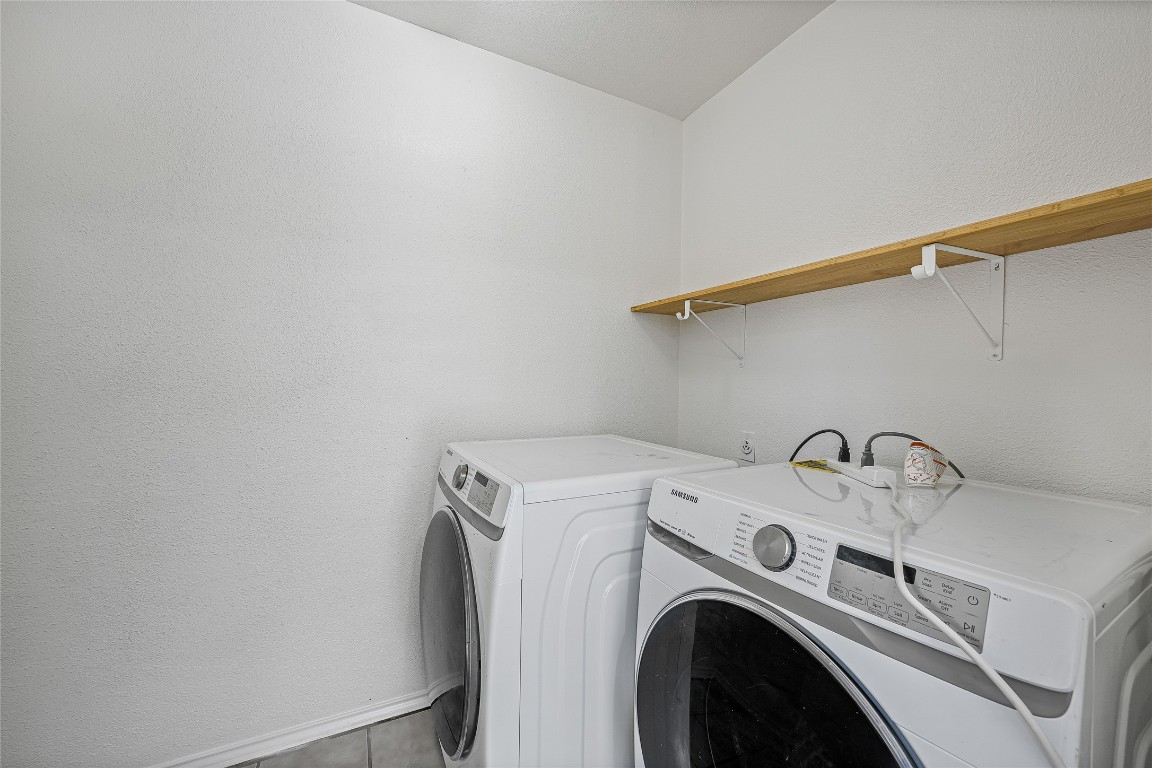 3007 Steck Avenue Austin, TX 78757 - Photo 5 of 15 a utility room with dryer and washer
