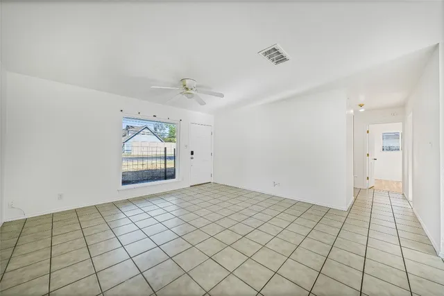 a view of an empty room and window