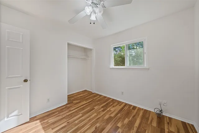 a view of a room with a window