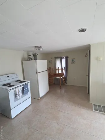 a view of kitchen and windows