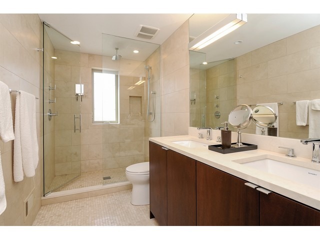 1336 West Fillmore Street Chicago, IL 60607 - Photo 8 of 20 a bathroom with a sink a toilet a shower and a mirror