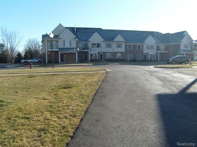 1108 Rial Lake Drive Howell, MI 48843 - Photo 8 of 19 1108 EXT VIEW.JPG