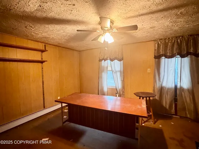 a room with a table and a projector