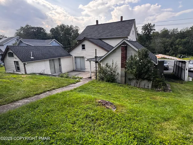 a view of a porch in front of house