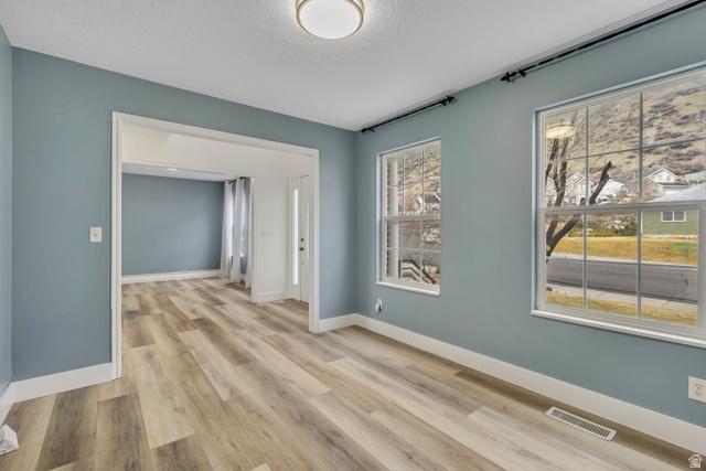 1083 North 700 East Springville, UT 84663 - Photo 9 of 54 Bright interior space with large windows and beautiful views all directions