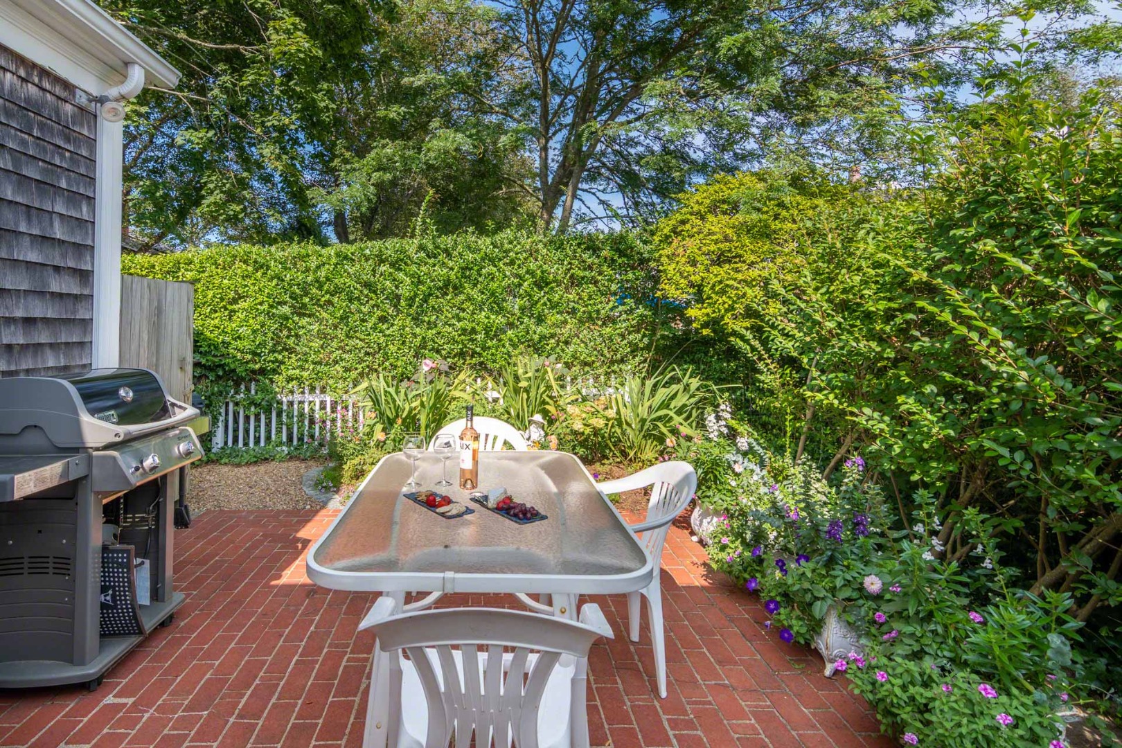 25 High Street Edgartown, MA 02539 - Photo 14 of 26 a view of a chairs and table in the balcony