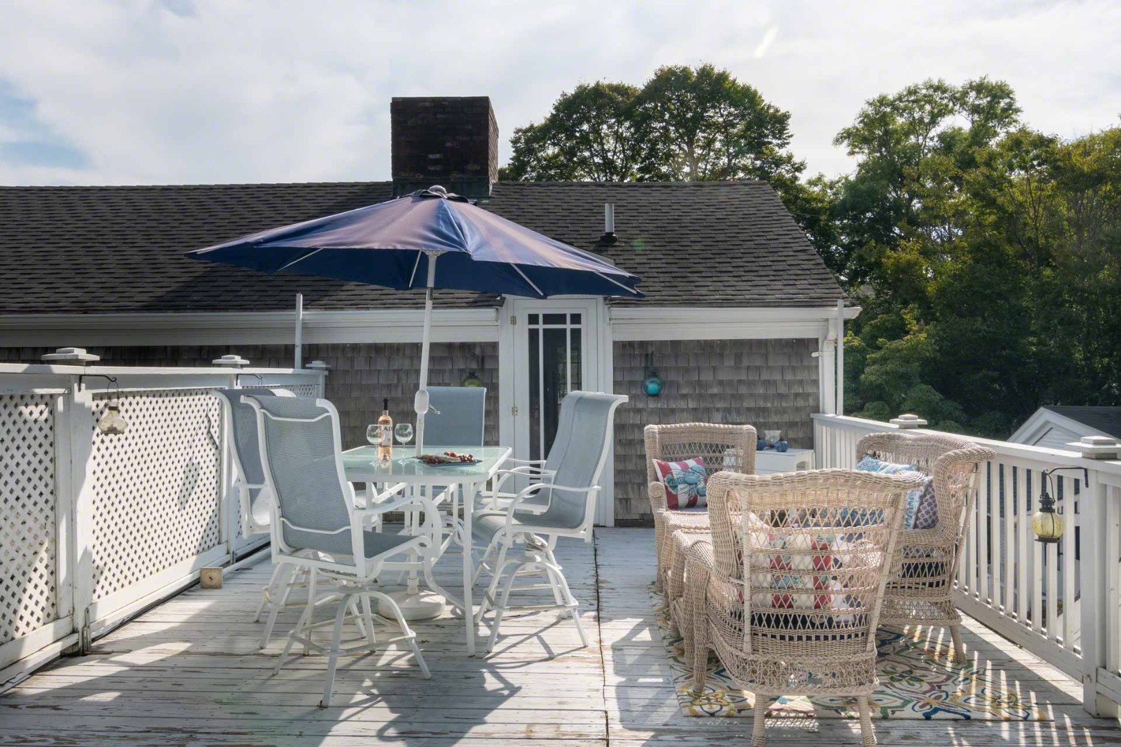 25 High Street Edgartown, MA 02539 - Photo 20 of 26 a patio with table and chairs