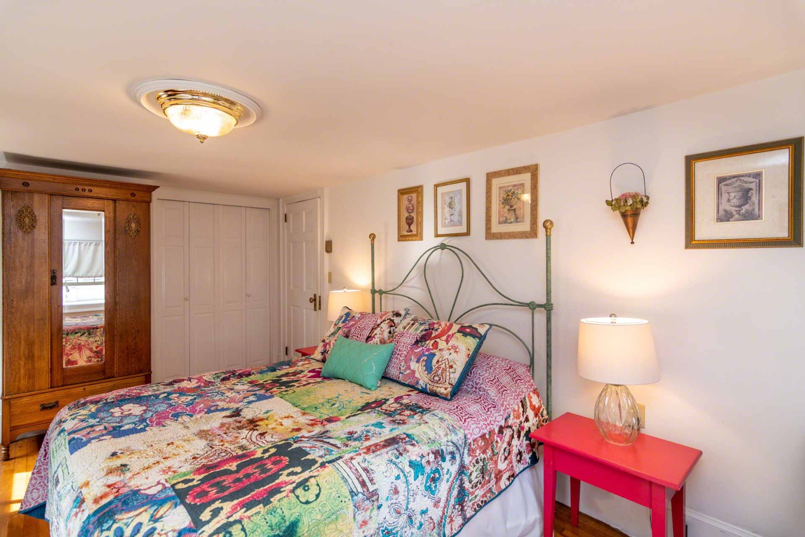 25 High Street Edgartown, MA 02539 - Photo 25 of 26 a bedroom with a bed and a lamp with window