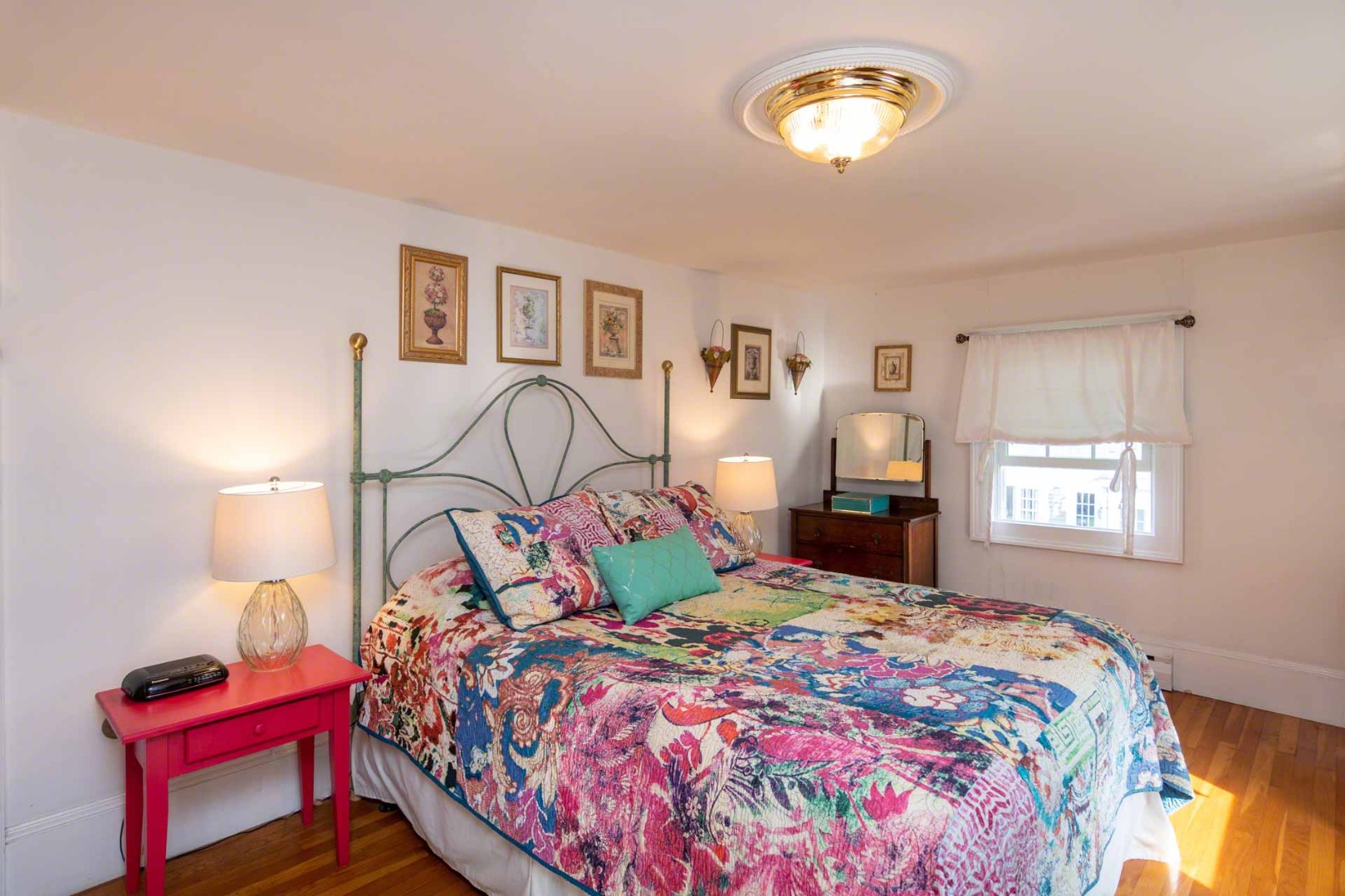 25 High Street Edgartown, MA 02539 - Photo 26 of 26 a bedroom with a bed and a window
