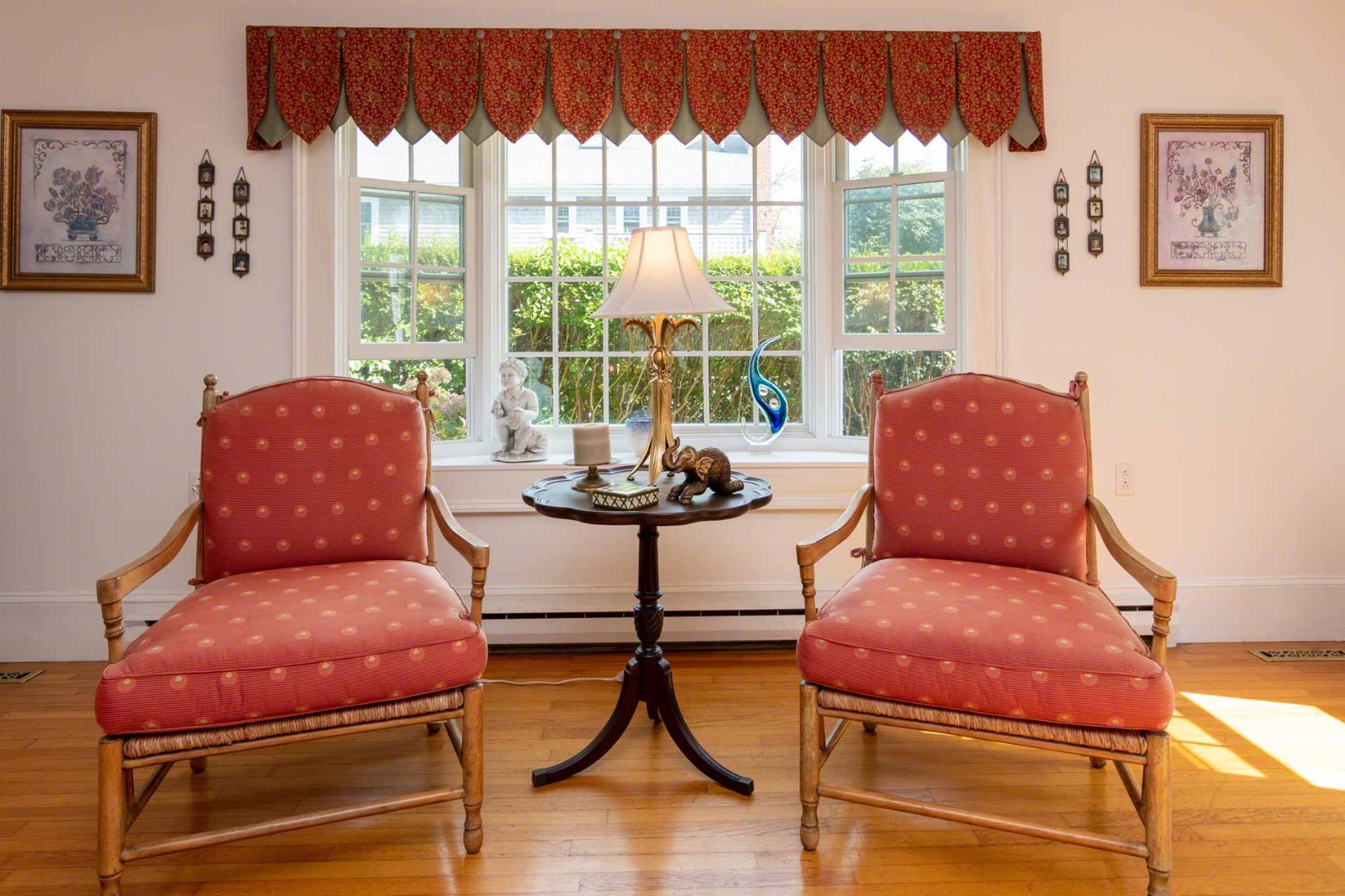 25 High Street Edgartown, MA 02539 - Photo 4 of 26 a living room with furniture and a floor to ceiling window