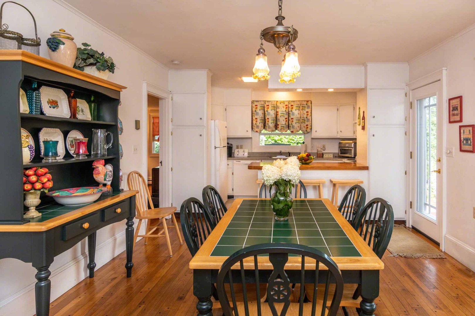 25 High Street Edgartown, MA 02539 - Photo 6 of 26 a dining room with furniture and wooden floor