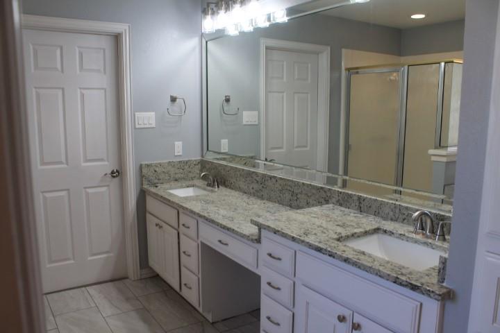 3051 Plainview Road Midlothian, TX 76065 - Photo 5 of 19 a bathroom with a granite countertop sink and a mirror
