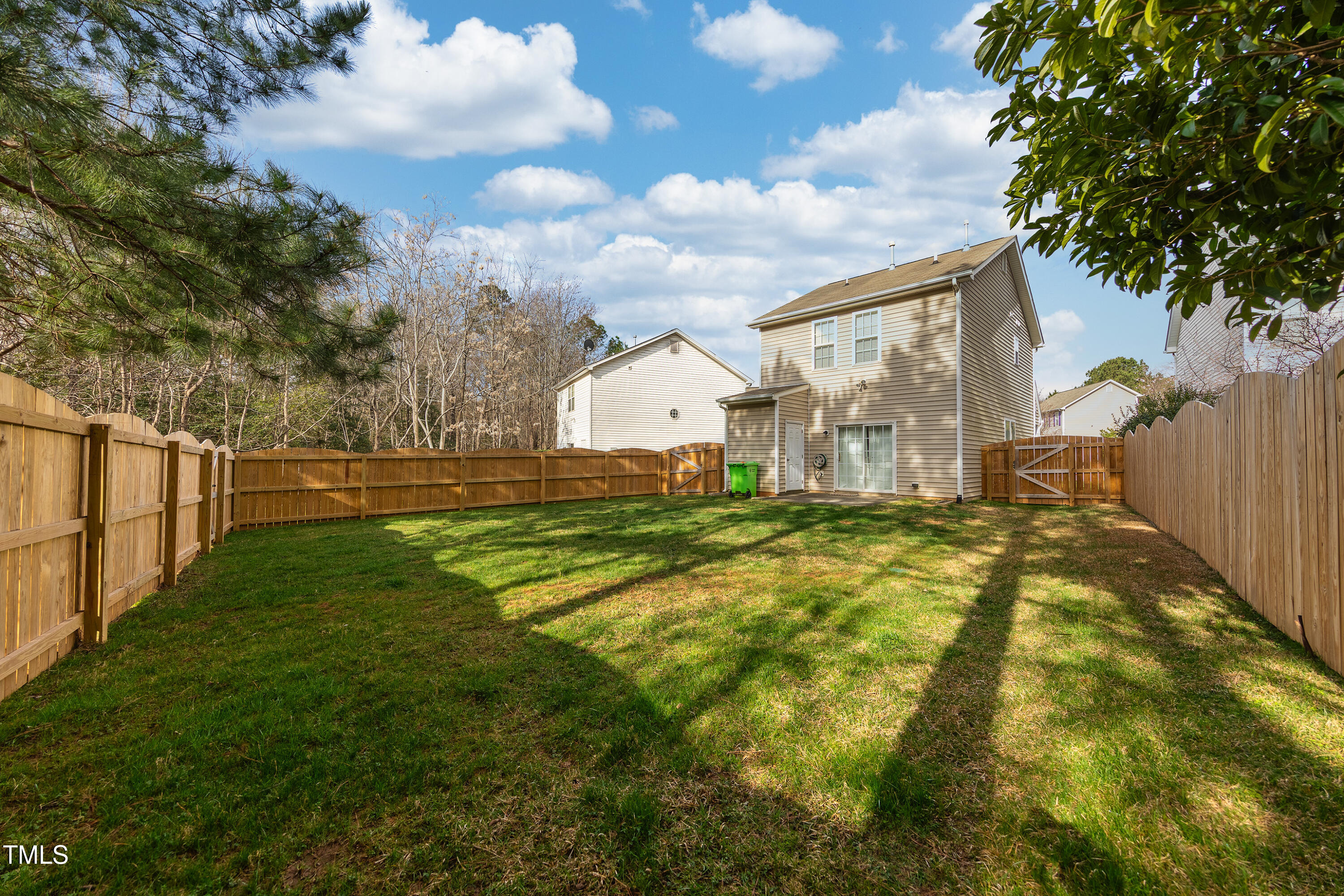 10809 Farmville Road Raleigh, NC 27614 - Photo 26 of 28 a view of a house with a yard