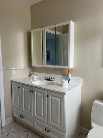 a bathroom with a sink and a toilet