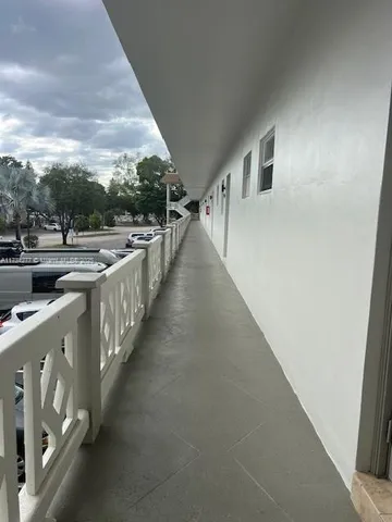 a view of a street with a houses