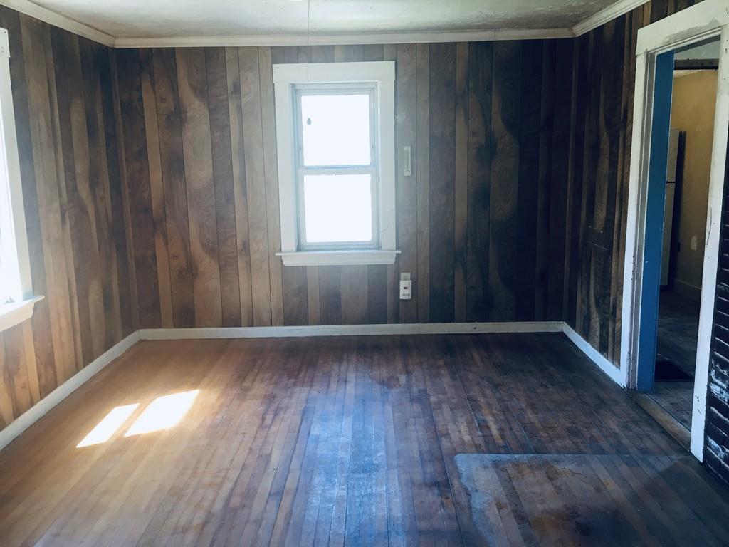 63 Gardner Road Hubbardston, MA 01452 - Photo 12 of 42 a view of wooden floor and windows in a room