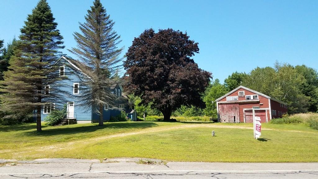 63 Gardner Road Hubbardston, MA 01452 - Photo 2 of 42 a front view of house with yard and green space