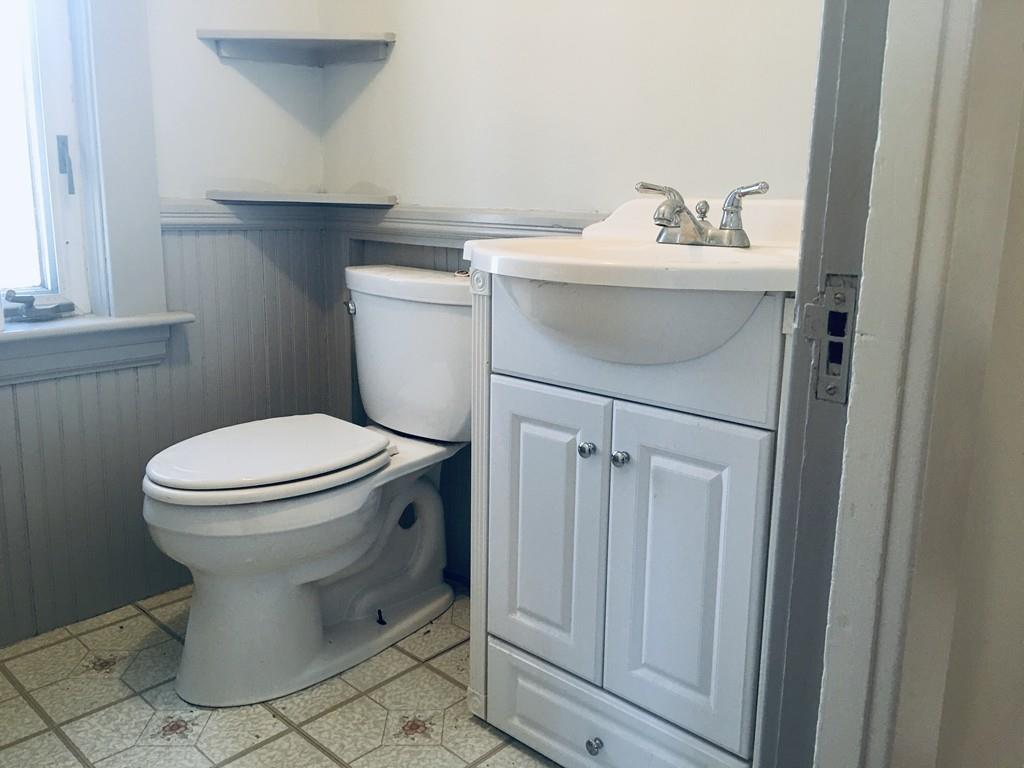 63 Gardner Road Hubbardston, MA 01452 - Photo 22 of 42 a bathroom with a toilet sink and mirror