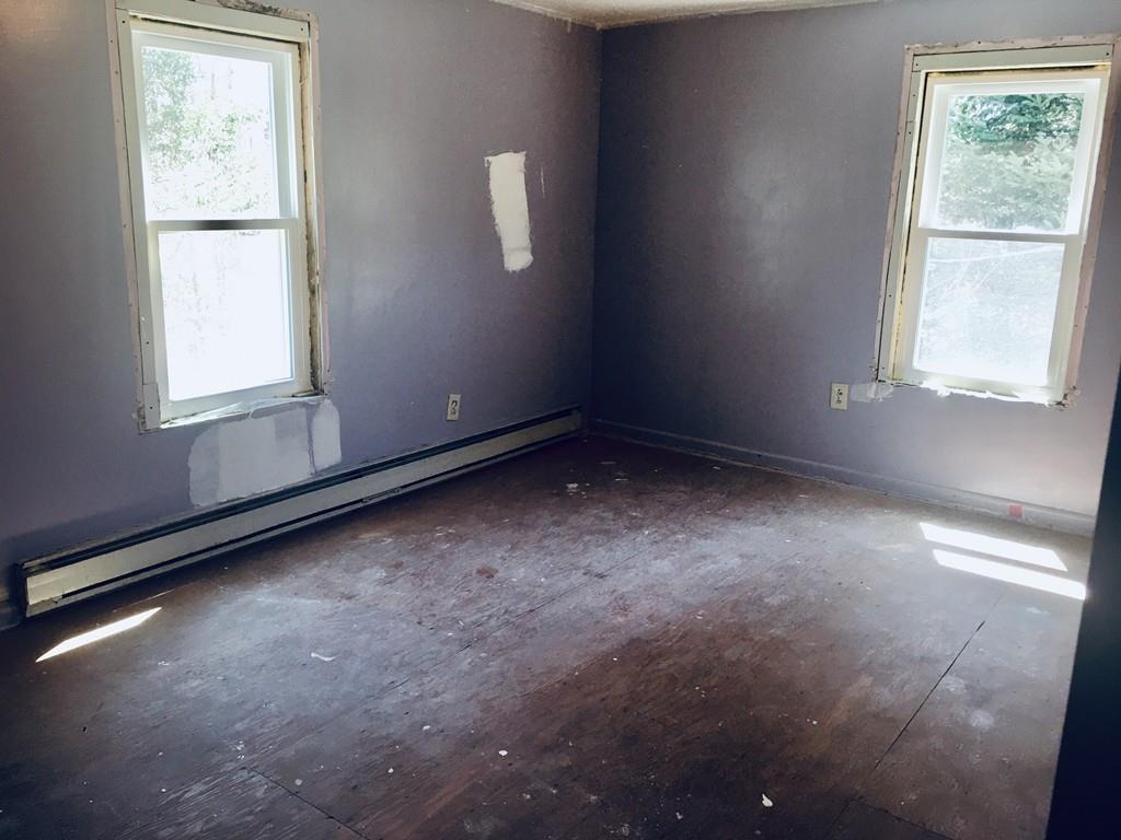 63 Gardner Road Hubbardston, MA 01452 - Photo 28 of 42 an empty room with a window