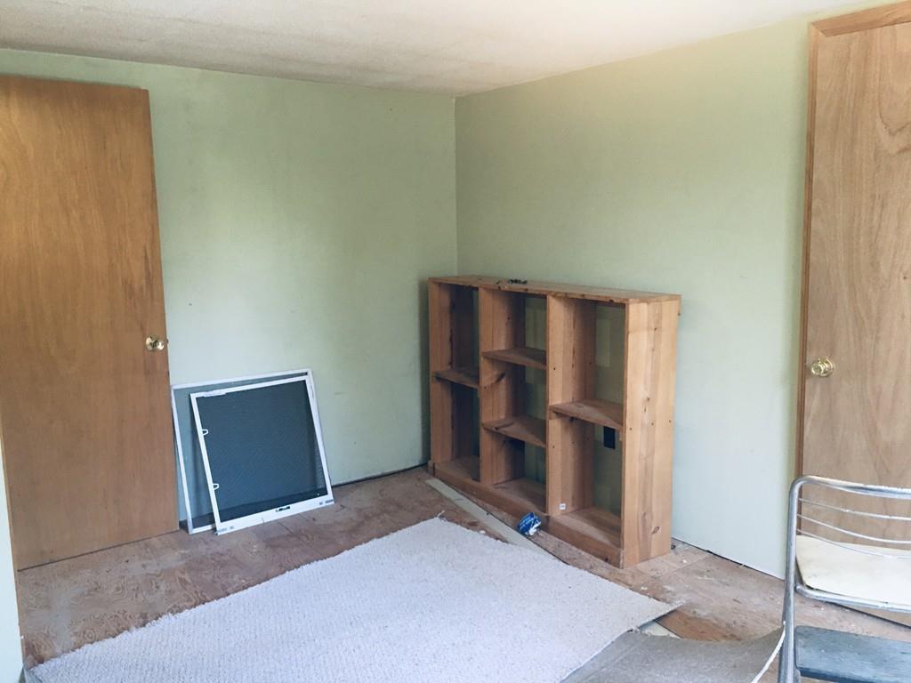 63 Gardner Road Hubbardston, MA 01452 - Photo 30 of 42 a view of an empty room and wooden floor